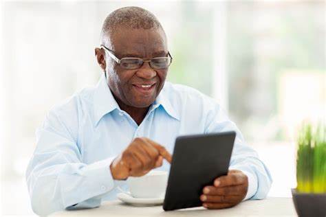 Man using technology on a tablet 